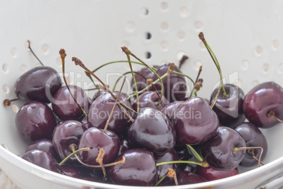 Fresh Cherries in a Sieve