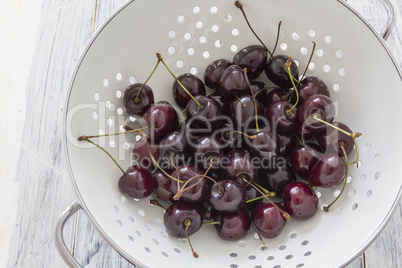 Fresh Cherries in a Sieve