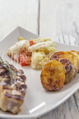 Fillet with fried Potatoes and salat
