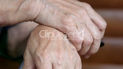 Gesticulating hands of senior woman during a conversation close-up