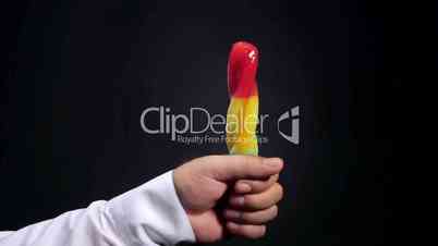 Colorful popsicle melting in male hand time-lapse