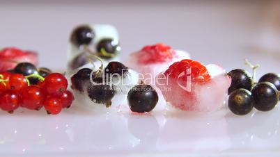 Fresh and frozen berries closeup time-lapse