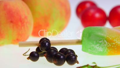 Dolly: Ice lolly with fresh fruit and berries close-up