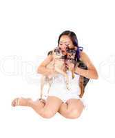 Woman hugging her dog's.