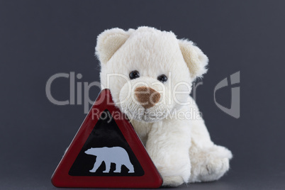 Stofftier Eisbär Baby mit Warnschild