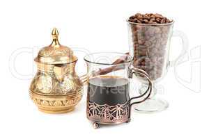 coffee pot and coffee beans isolated on white background