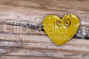 Heart on cracked Wood