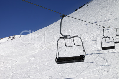 Chair-lift at ski resort Chair-lift at ski resort