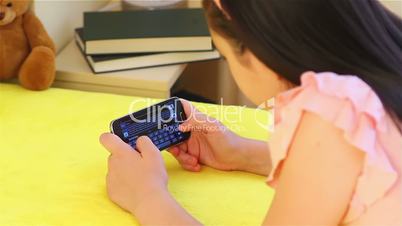 Teenager girl messaging on smart phone 3