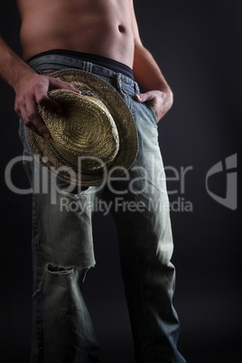 Attractive man with a straw hat