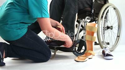 Orthopedic equipment for young man in wheelchair 2