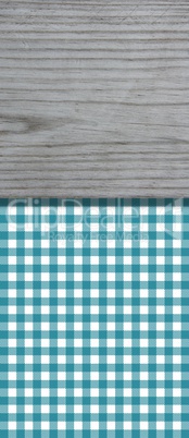 Tischdeckenmuster blau mit Holzbrett als Hintergrund für Text