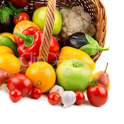 fruits and vegetables in a basket isolated on white background