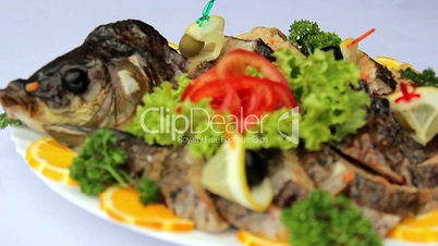 Fish dish with vegetables, stuffed with fish, seafood