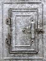 small vintage tin door in grunge style