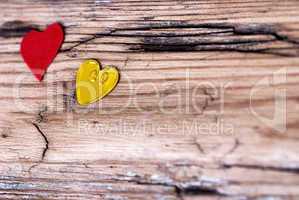 Two little Hearts on Wooden Plank