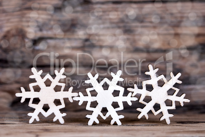 Three Snowflakes on Wood III