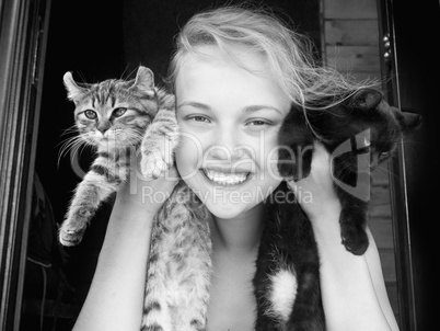 Girl and kittens