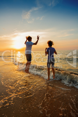 Boy and girl on the beach