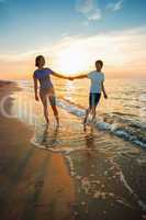 Boy and girl on the beach