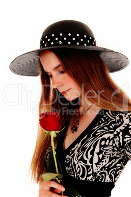 Woman with hat and rose.