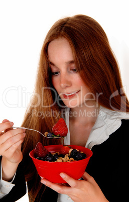 Woman eating breakfast.
