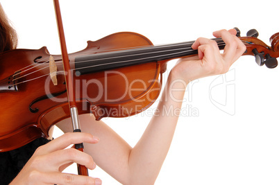 Closeup of violin playing.
