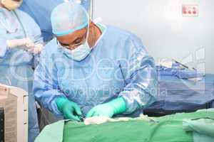 Doctor using tools in a surgery