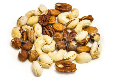 Heap of assorted nuts .