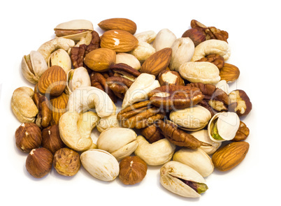 Heap of assorted nuts .