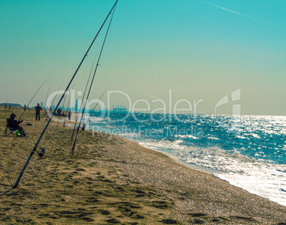 Fishing rods on the beach.