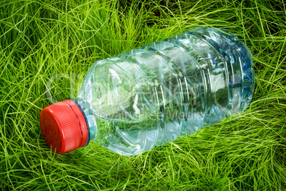 Water bottle on the grass.