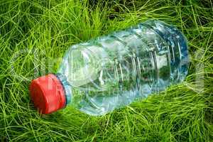 Water bottle on the grass.