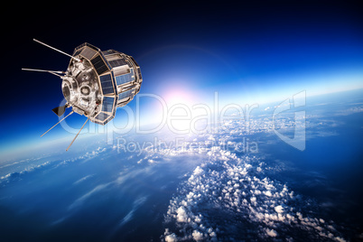 Space satellite over the planet earth