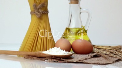 Italian pasta, Italian pasta ingredients, flour, pasta assortment of olive oil in a bottle, still life, spices spaghetti, studio