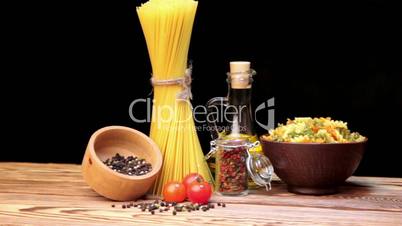 Italian pasta, Italian pasta ingredients, flour, pasta assortment of olive oil in a bottle, still life, spices spaghetti, studio