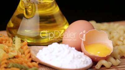 Italian pasta, Italian pasta ingredients, flour, pasta assortment of olive oil in a bottle, still life, spices spaghetti, studio