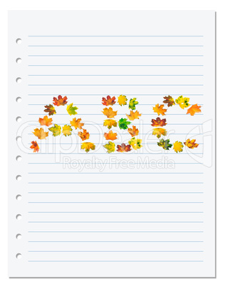 Notebook paper with letters A B C composed of autumn maple leafs