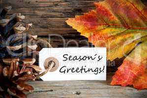 Label with Seasons Greetings, Fall Background