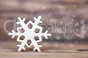 Snowflake on Wood with Bokeh