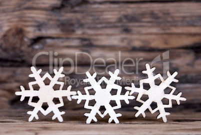 Three Snowflakes on Wood I