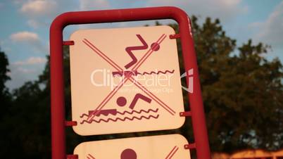 No Swimming and jump Sign