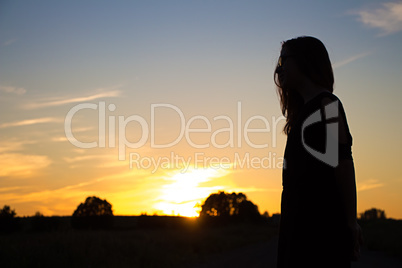 Silhouette of teenager girl in the light