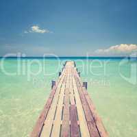 Wooden bridge towards sea