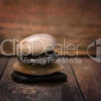 Pebbles stock on wooden background