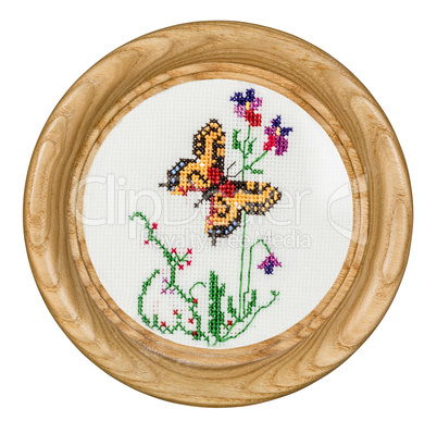 Embroidered picture in the frame, isolated on white background