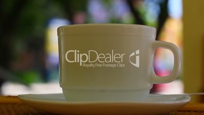 Coffee cup with street background
