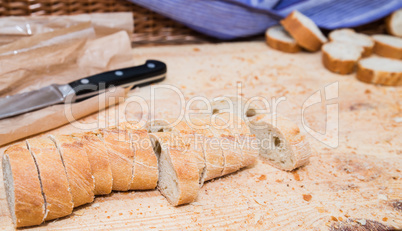 Sliced bread on wood texture
