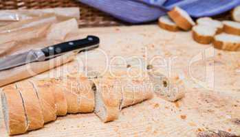 Sliced bread on wood texture