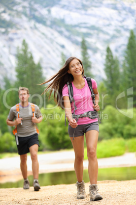 Hiking people - couple hikers happy in Yosemite